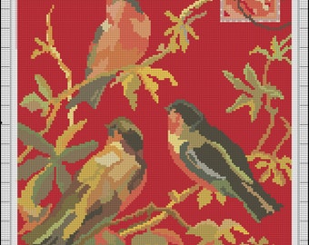 May include: Three birds perched on branches with green and yellow leaves against a red background. The birds are brown, yellow, and black with red accents. A small postage stamp is in the upper right corner.