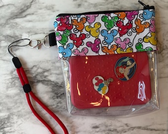 Bolsa para tablón de anuncios con correa para la muñeca.