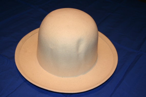 cream bowler hat