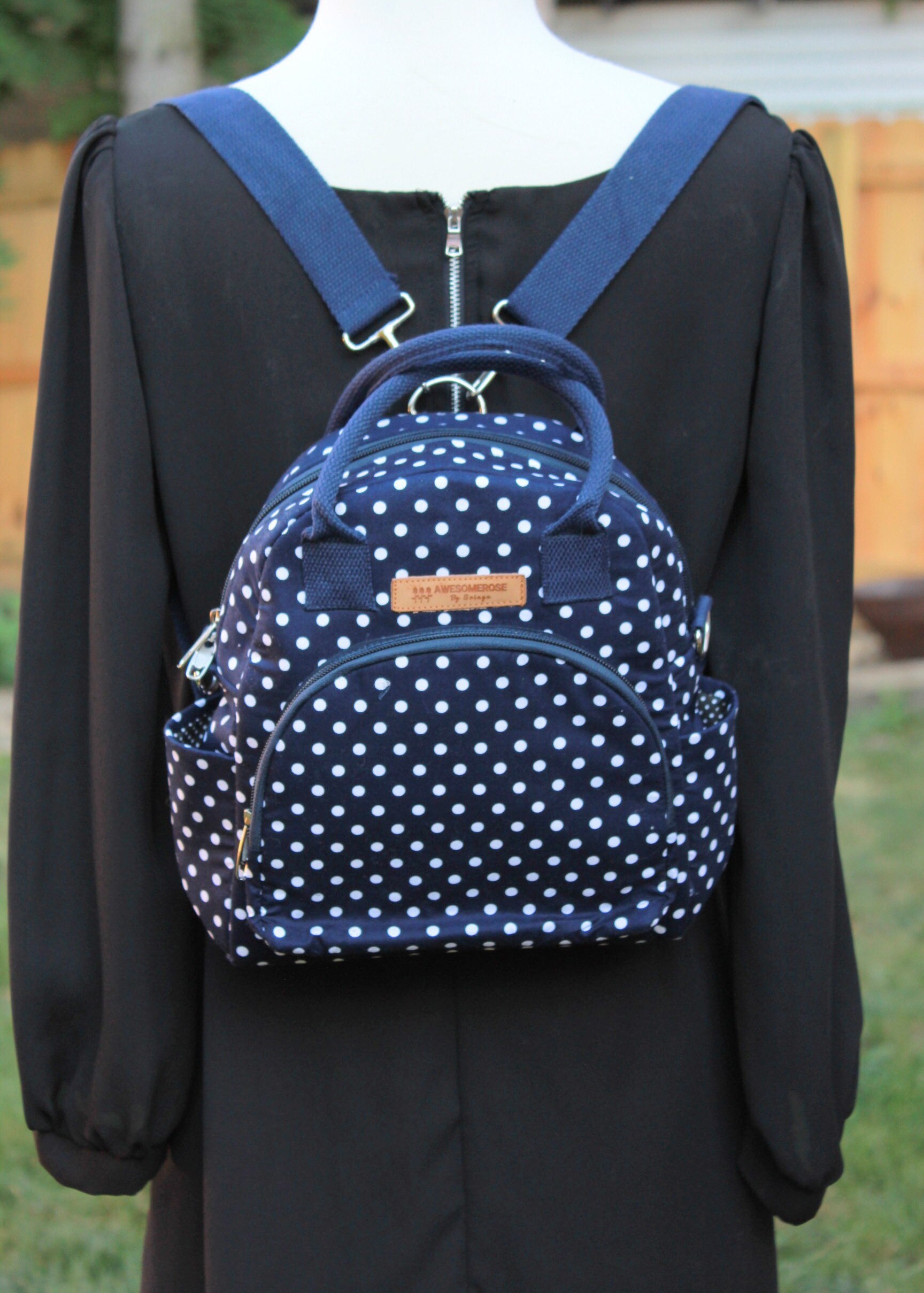 navy polka dot backpack