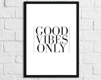 May include: Black and white framed print with the text "GOOD VIBES ONLY" in a bold, sans-serif font.