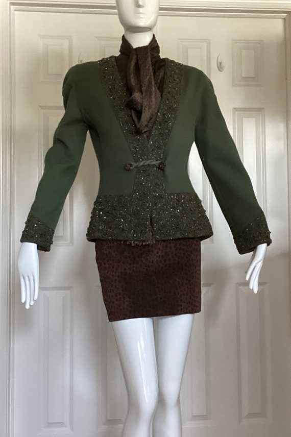 Oscar De La Renta vintage late 80s three piece skirt suit with animal print leather skirt, silk blouse with fringed tie, and beaded jacket