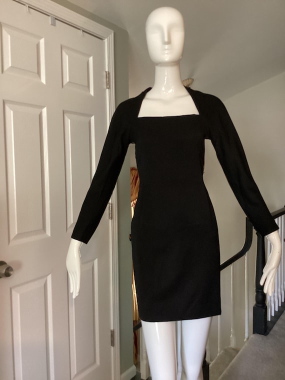 Christian Lacroix, Christian Lacroix vintage 1989 black wool sheath dress, size I42 or USA 8, knee length with u inquest neckline, lined, long sleeves