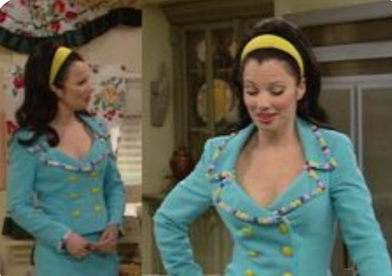 The Nanny wore this skirt suit in the turquoise ve