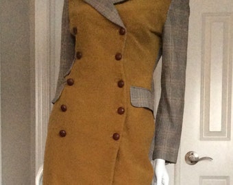 Byrun Lars vintage 1991 unworn coat dress with his iconic wasp waist to make a play on a man’s chesterfield coat, size 6.