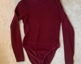 Donna Karan New York, DKNY vintage 1991 bodysuit, unworn, size Medium, crew neck, long sleeves, burgundy color.