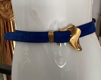 Donna Karan vintage 1989 blue suede belt with Robert Lee Morris buckle. S to M holes to adjust size.     Buckle matches other pieces.