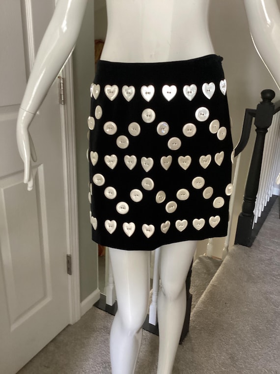 Moschino Cheap and Chic, Moschino Cheap and Chic vintage 1992 unworn black velveteen skirt with glow-in-the-dark plastic appliqué, size 8