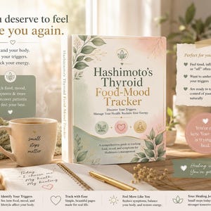 May include: A book titled Hashimoto's Thyroid Food-Mood Tracker with a floral cover, a beige ceramic mug with the text small steps matter, a spiral-bound notebook with handwritten text, and a gold pen. The book cover features green and pink accents.