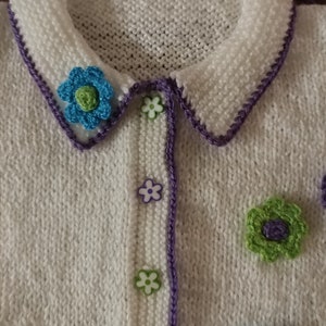 FLOWERS  for Spring !Classic Bright Colored Hand Crocheted Flowers on a Crisp White SweaterApprox.18 mo size, easy care. By Helen Rosenhaft.