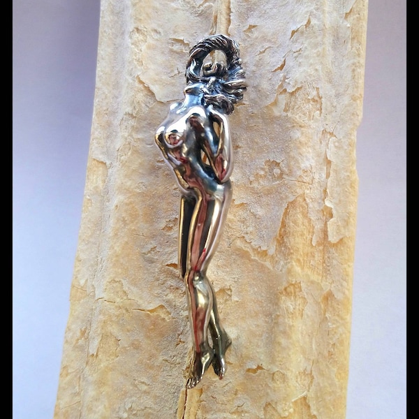 Naked woman pendant