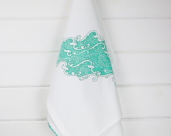 Tea towel: sea green Koru design on 100% cotton