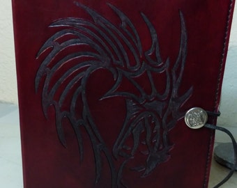 leather "bolt bound" dragon tooled book