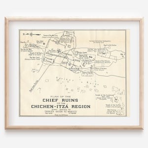 May include: A framed vintage map of the Chichen-Itza ruins in Mexico. The map is in black and white, with detailed illustrations of the archaeological zone. The text reads "Plan of the Chief Ruins of the Chichen-Itza Region".