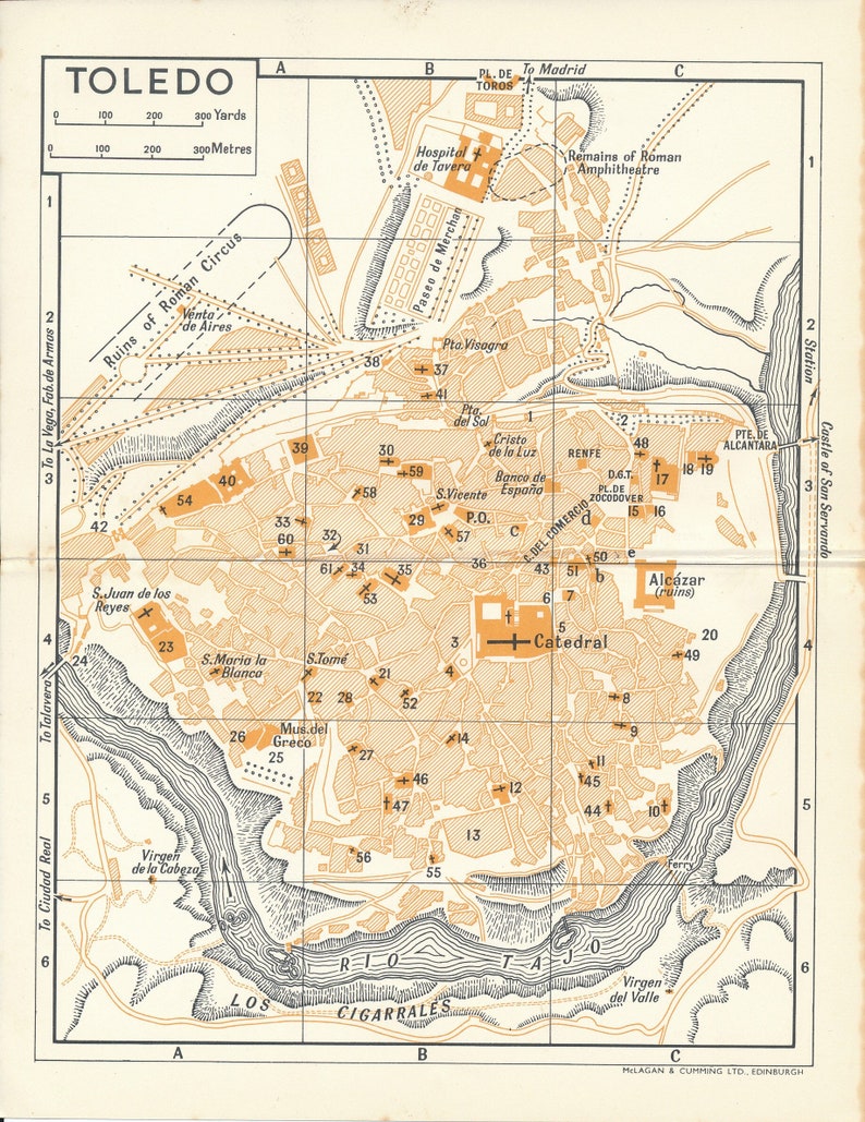 May include: A vintage map of Toledo, Spain, with a grid overlay and numbered points of interest. The map highlights the Alcazar, Cathedral, and other historical landmarks. The map is printed on a cream-colored background with brown and black lines.