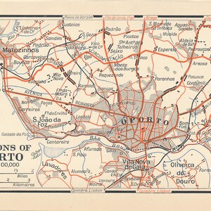 K&ouml;nnte beinhalten: Eine Vintage-Karte der Region Porto in Portugal, die die umliegenden St&auml;dte und Gemeinden zeigt. Die Karte ist in Schwarz, Rot und Blau auf cremefarbenem Hintergrund gedruckt. Die Karte enth&auml;lt eine Skala in Meilen und Kilometern.