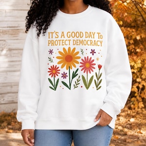 Sweatshirt met bloemenprint en democratiemotief, subtiele politieke protesttrui met ronde hals, progressieve activistische trui, liberale feministische kleding
