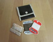 Cute miniature black white travel pocket sewing kit