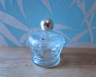 Vintage moulded glass round scent/perfume bottle with screw-top, fleur-de-lys design