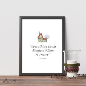 May include: A printable quote about winter with a watercolor illustration of a small house with a red roof and snow falling. The quote reads "Everything looks magical when it snows" - Lorelai Gilmore.