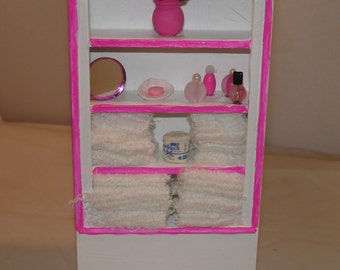 Mini Bathroom Cabinet with Pink accessories