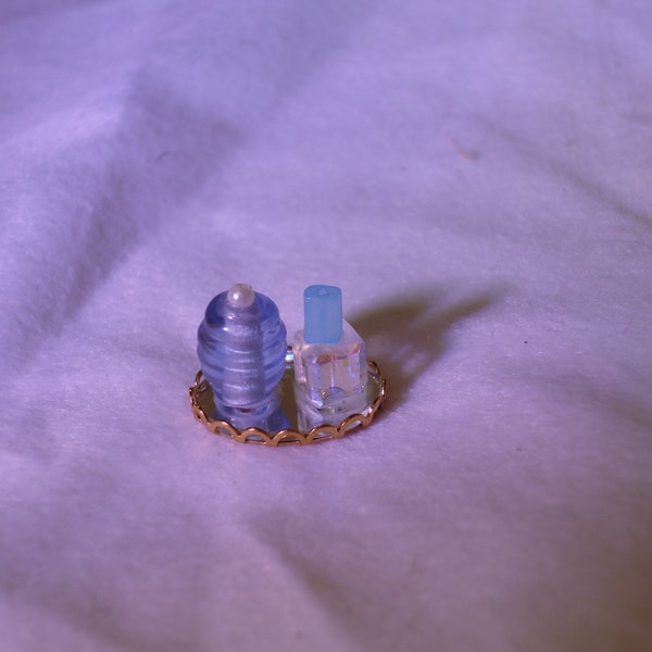 Mini Perfume Bottles on Small Metal Tray