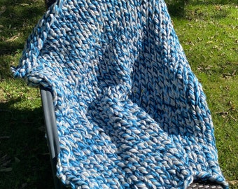 Chunky finger knit blanket made of roving material. Ready to ship free shipping in US