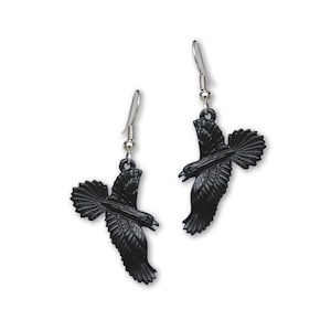 May include: A pair of black crow earrings with silver hooks. The crows are in flight with their wings spread.