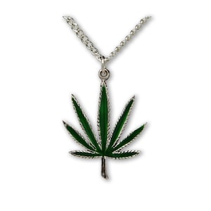 May include: A silver chain necklace with a green enamel marijuana leaf pendant.