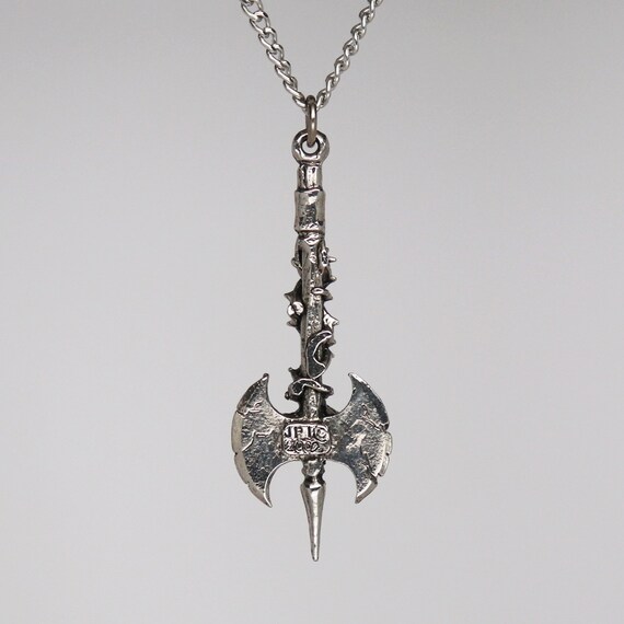 Double Axe in Vines With Skull and Red Crystals Pendant