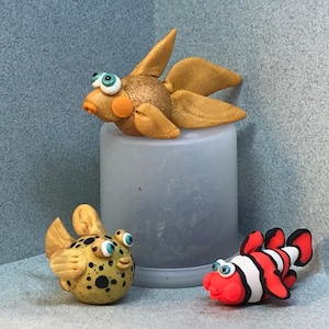 Fishies! Assorted miniatures: Puffer fish, Clown fish, Goldfish and MORE!  Your choice of one.