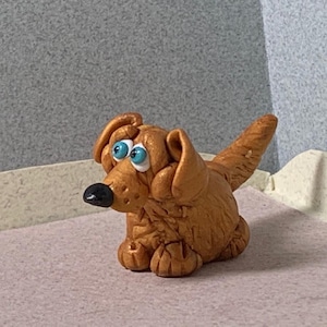 Golden Retrievers miniatures, Your choice of one.