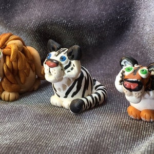 Big Cat Country: Lions and Tigers and.... Classic big cat miniatures.  Your choice of one.