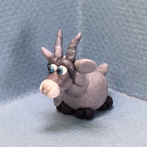 Goat miniatures.  Your choice of one.