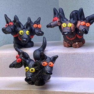 Cerberus. Hell Hounds. Guardians of Hades. Three headed dog miniatures.  The Cerberus 'brothers' in three color options.