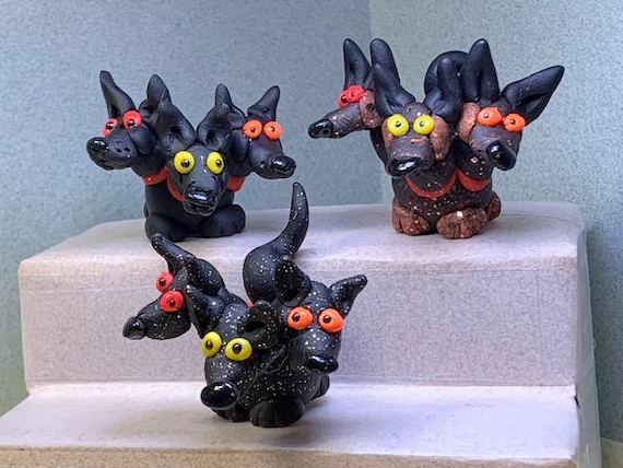 Cerberus. Hell Hounds. Guardians of Hades. Three Headed Dog