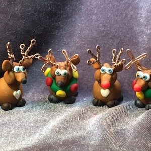 Reindeer Miniatures, stylized.  Your choice of one.