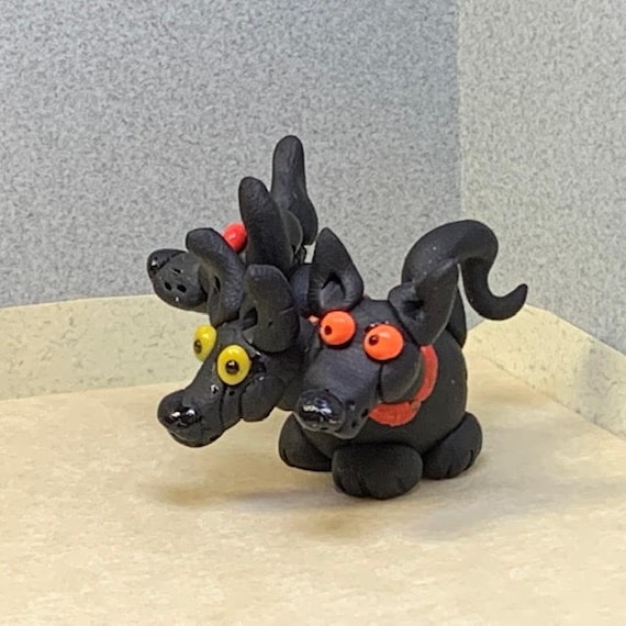 Cerberus. Hell Hounds. Guardians of Hades. Three Headed Dog