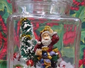 Handmade Christmas Diorama with Vintage Decorations - Santa Claus, Toys, Bottle Brush Tree with Faux Snow in a Glass Container - Retro