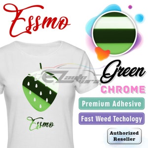 May include: White t-shirt with a green and white strawberry graphic and the text "Essmo" printed on the front. The shirt is a promotional item for Essmo Green Chrome, a premium adhesive with fast weed technology.