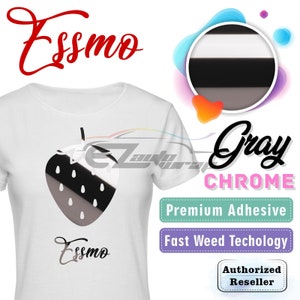 May include: A white t-shirt with a gray chrome strawberry graphic and the word "Essmo" written in black. The shirt is a promotional item for Essmo, a company that sells premium adhesive vinyl with fast weed technology.