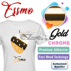 May include: A white t-shirt with a gold chrome strawberry graphic and the text "Essmo" printed on the front. The shirt is a promotional item for Essmo Gold Chrome Premium Adhesive.