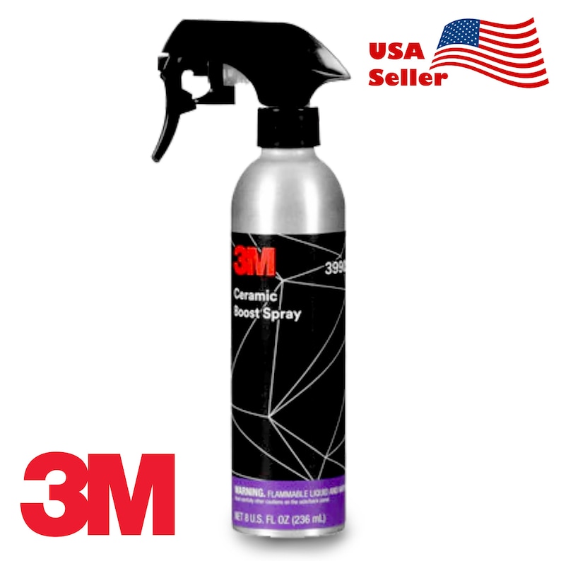 May include: A silver spray bottle with a black trigger sprayer. The bottle is labeled "3M Ceramic Boost Spray" and has a black and white geometric design. The bottle contains 8 fl oz (236 ml) of product.