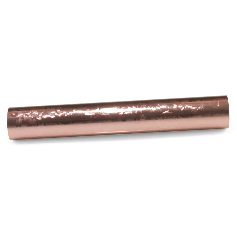 May include: A roll of rose gold metallic wrapping paper with a subtle embossed pattern.