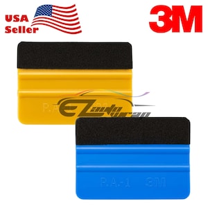 May include: Two 3M squeegees, one yellow and one blue, with black felt edges. Both squeegees have the text "P.A. 1" and the 3M logo printed on them.