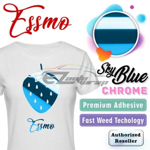 May include: A white t-shirt with a blue and white strawberry graphic and the word "Essmo" printed on it. The shirt is displayed on a white background with a blue and white striped circle and the words "Sky Blue Chrome", "Premium Adhesive", "Fast Weed Technology", and "Authorized Reseller" printed on it.