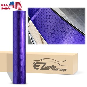 May include: A roll of purple vinyl wrap with a honeycomb pattern. The wrap is shown next to a car with the same pattern applied. The image also includes the text "USA Seller" and the logo "EZ Auto Wrap".