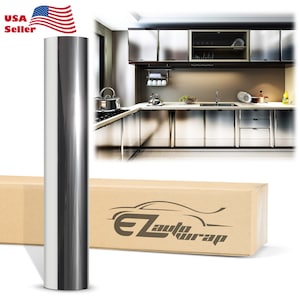 May include: A roll of silver chrome vinyl wrap film for car, truck, or home decor projects. The film is shown next to a box with the logo "EZ auto wrap".