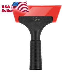 May include: A red squeegee with a black handle featuring a textured grip and the brand name Essmo printed in white script on the head. The tool has a wide, flat blade edge designed for smoothing surfaces, presented against a plain white background.