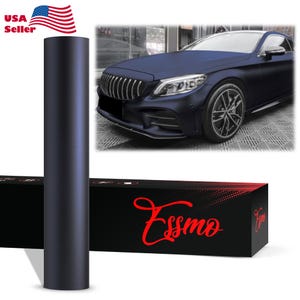 May include: A roll of dark blue car wrap film next to a navy blue car. The film is cylindrical and has a matte finish. The box below the film has the word "Essmo" in red script. The American flag and the words "USA Seller" are in the upper left corner.